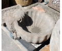Antique sandstone holy water font or wall fountain
