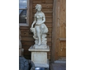 Aged Carrara white marble greco-Roman sitting woman with plinth 