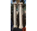 Pareja de columnas clasicas en estilo dorico en mármol travertino