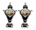 Pair of French style porcelain urns with lids