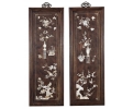 Pair of oriental decorative vertical wooden panels with mother of pearl inlay still life and nature scenes