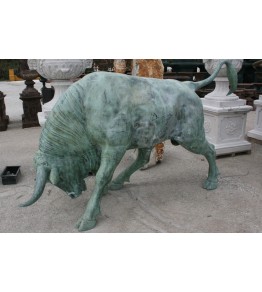 Pair of life-size bronze sitting lion statues