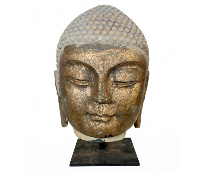 Gilt aged black marble Buddha head...