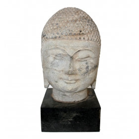 Aged white marble Buddha...