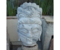 Escultura de piedra oriental rostro mujer