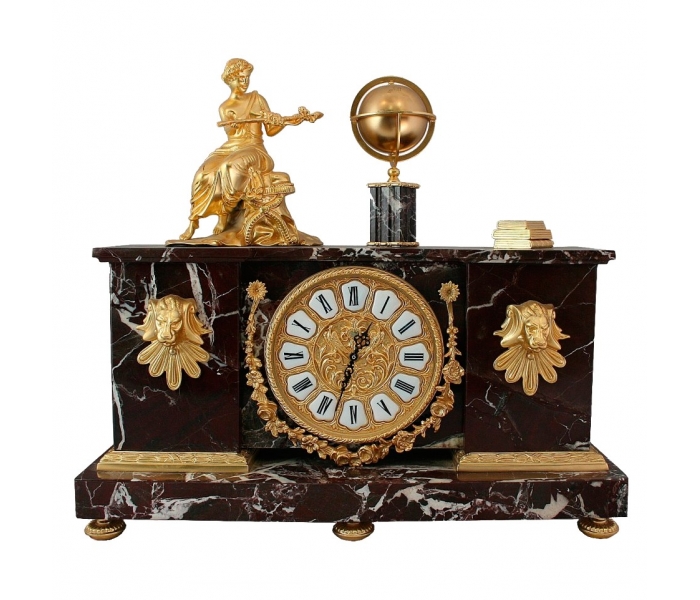 Reloj realizado en mármol y bronce
