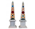 Pair of white Carrara marble 61 cm tall obelisk decorated with geometric stone panels, including blue lapis lazuli.