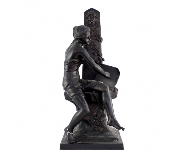 Escultura de bronce mujer
