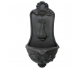 Cast iron wall fountain with fish