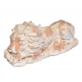 Aged terracotta lying lion...