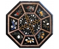 Octagonal marble table top decorated with Italian pietra dura Classical plant still-life mosaic inlay.