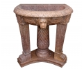 Hand carved rosso levanto burgundy marble washbasin with pedestal claw feet and relief lionhead.