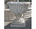 Hand carved fluted sandstone garden urn