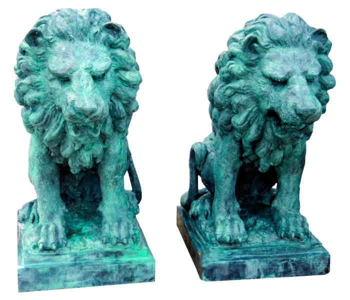 Pair of life-size bronze sitting lion...