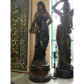 Life-size bronze woman with...
