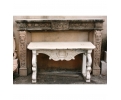 Sanstone fireplace mante with statuary goat heads on jambs