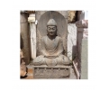 Aged black marble sitting Buddha sculpture