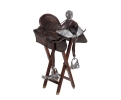 Leather childrens horse riding saddle with silver stirrups and spurs