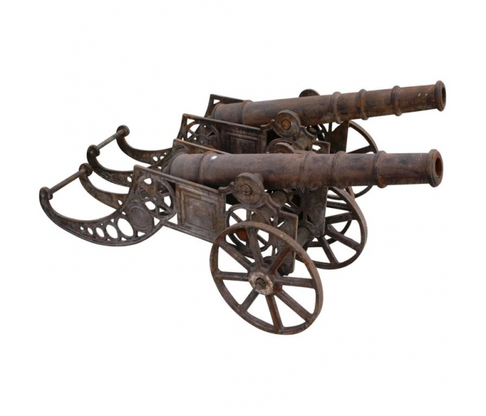 Pair of cast iron cannon on wheels...