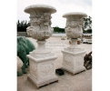 Very large pair of Carrara white garden urns with pedestals