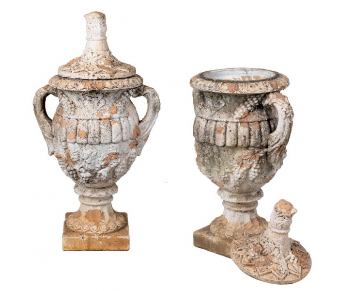 Pair of aged terracotta garden urns...