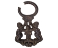 16th century Venetian bronze door knock with children figures on the sides and faces in the middle.