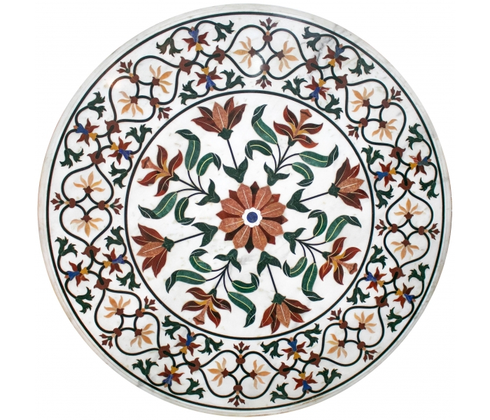 Round marble table top decorated with...