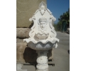 Macael white marble wall fountain with man head mascaron