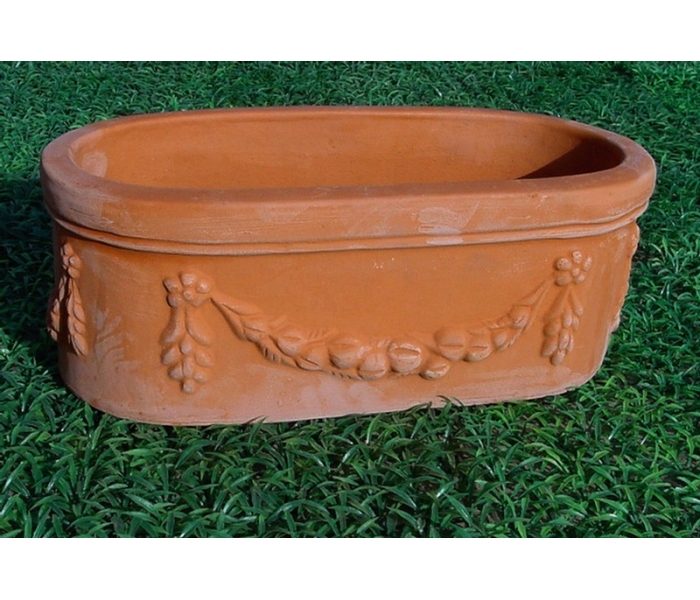 Terracotta oval garden planter with...