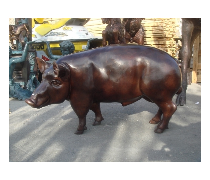 Escultura de cerdo en bronce