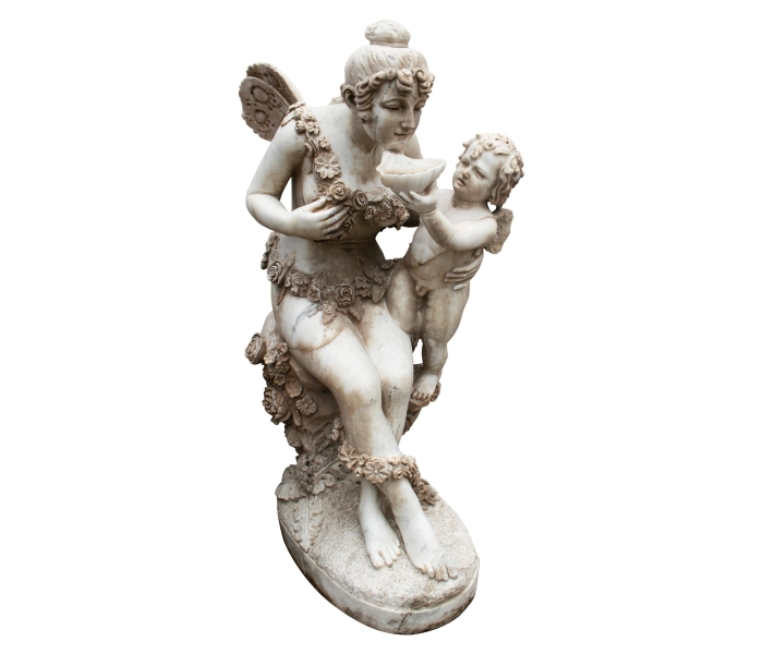 Aged hand carved white marble statue...
