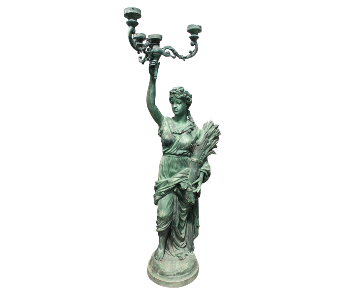 Bronze woman holding wheat sheaf and...