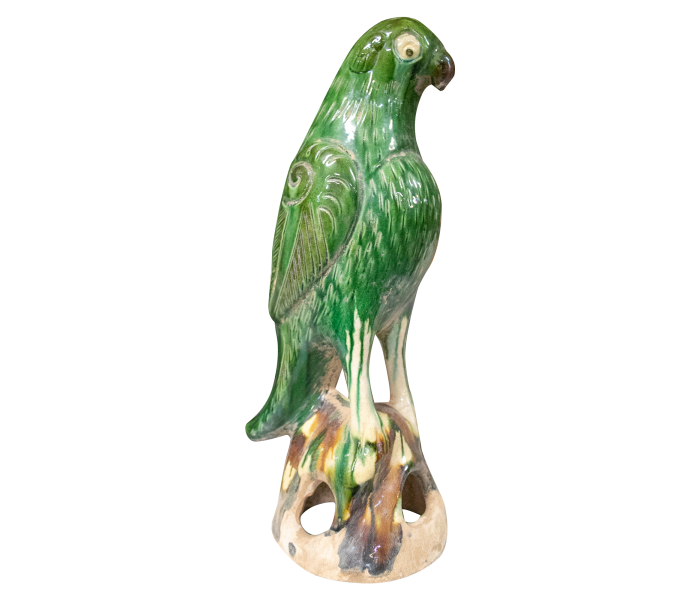 Glazed terracotta parrot figure...