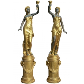 Pair of women torchiere...