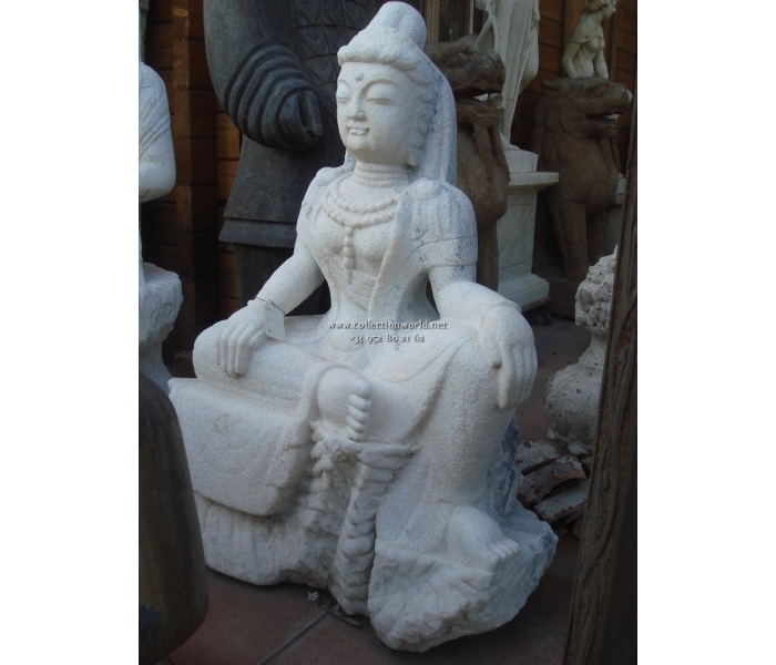 Aged white marble sitting Buddha...