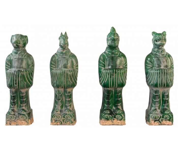Set of four green glazed Terracotta...