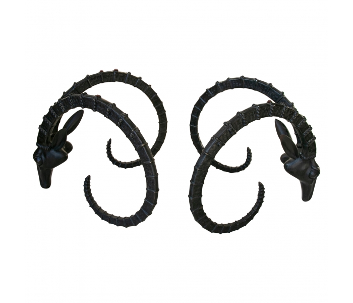 Two Bucranes bronze table bases...