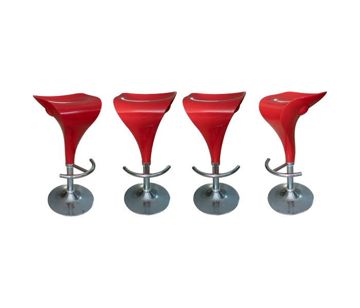 Set de cuatro taburetes rojos sin...
