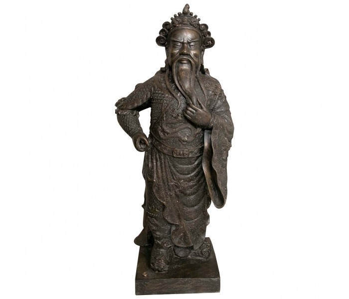 Escultura de bronce de monje budista