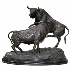 Figura de bronce con toros...