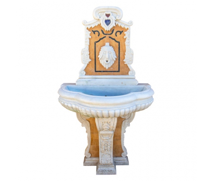 Hand-carved marble fountain with lion...
