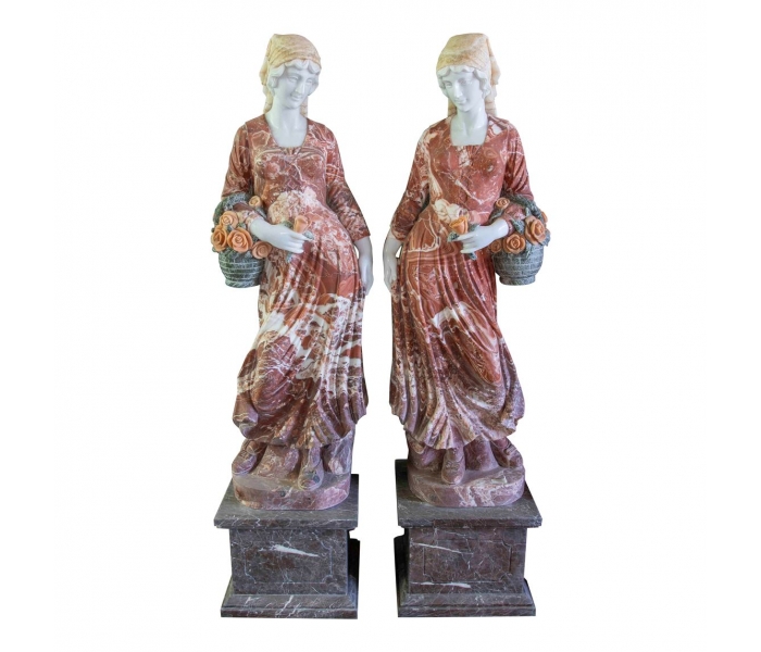 Pair of sculptures of ladies with...