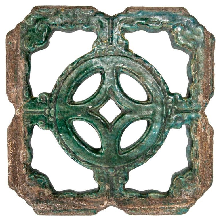 Azulejo oriental esmaltado verde del siglo XIX